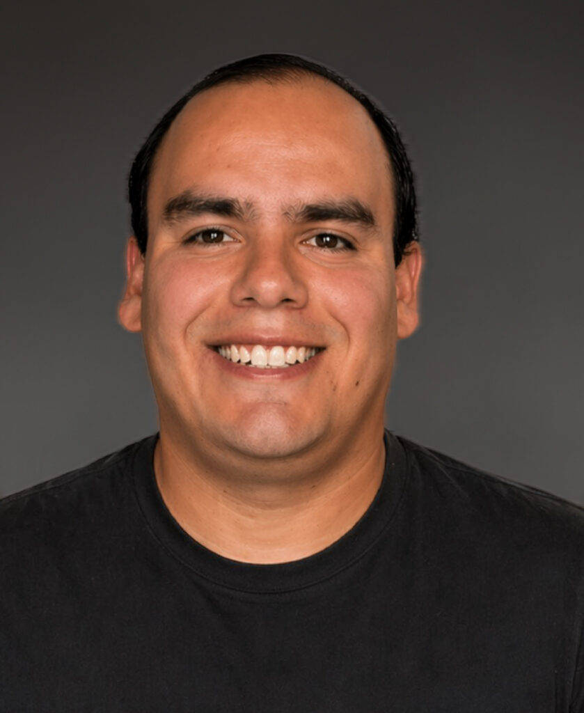 Professional headshot of Alexis Gonzalez, a member of the Phluence leadership team, smiling against a neutral background.